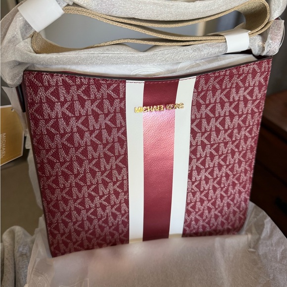 Michael Kors Handbags - Michael Kors Burgundy and White Crossbody Bag